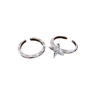 Silver flower open ring with marquise cubic zirconia petals and minimalist band