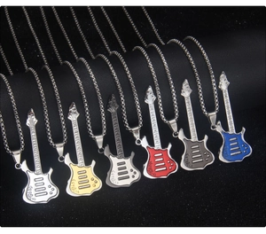 Detailed view of colorful guitar necklaces in gold, silver, black and blue stainless steel