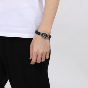 Fashionable black leather braided bracelet with silver lion head skull clasp for men