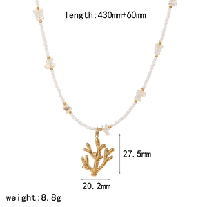 Detailed view of marine coral pendant necklace with white beads and measurement data