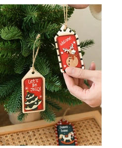 Détail de pendentifs de Noël en bois rétro peints à la main avec ficelle de jute