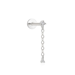 Macro view of S925 sterling silver star earring with chain and sparkling cubic zirconia