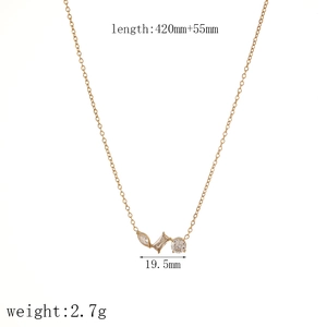 Detailed view of gold cross pendant with dimensions 19.5mm and 420mm chain length