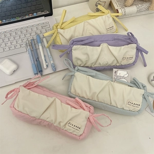 Large capacity bow pencil case in pastel fabric colors for students and office use