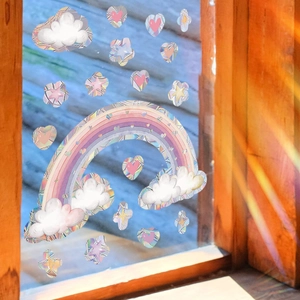 Suncatcher window decal with rainbow cloud design creating vibrant holographic light effects