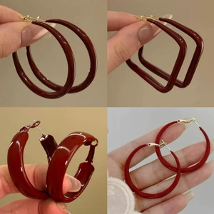Deep red acrylic C-shape hoop earrings with silver needles shown from multiple angles