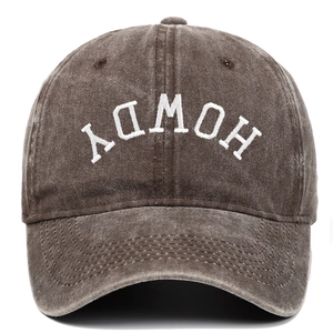 Detail of Howdy 3D white letter embroidery on vintage washed cotton baseball cap