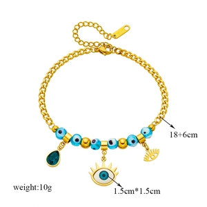 Gold stainless steel evil eye bead bracelet with teardrop pendant and blue charms