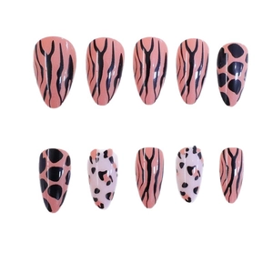 Short almond press-on nails with pink and black leopard and zebra animal print patterns