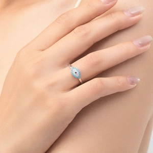 S925 sterling silver turquoise evil eye ring worn on finger with sparkling crystals