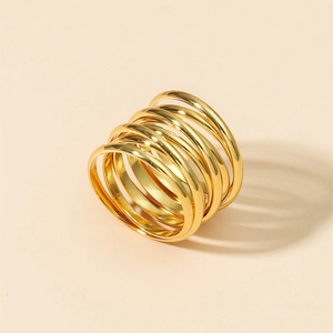 Minimalist multi-layer gold spiral ring with a high-polished metallic finish for women