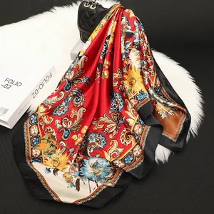 Baroque floral satin square scarf with red and yellow patterns on plush background