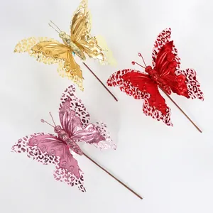 Three hollow glitter butterfly ornaments in gold red and pink for Christmas tree decor
