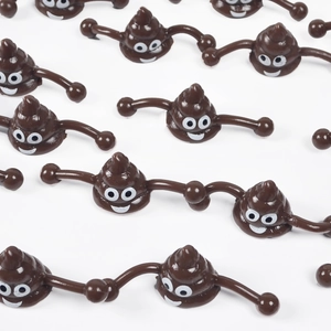 Funny slingshot poop prank toys with smiley faces arranged on a plain white background