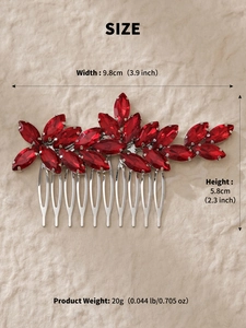 Detail view showing dimensions of a red rhinestone hair comb with leaf motif and silver teeth