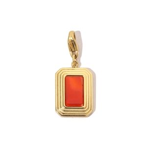 Detail of a rectangular orange gemstone pendant with a gold stainless steel lobster clasp