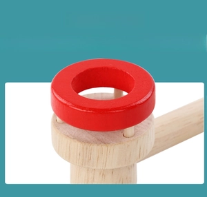 Macro shot of wooden breath trainer featuring safe, non-toxic red water-based paint