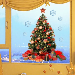 Detail of Christmas tree window decals with red and gold ornaments and gift boxes