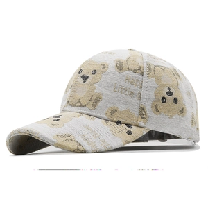 Light baseball cap with bear embroidery and Happy Little Bear print on a white background