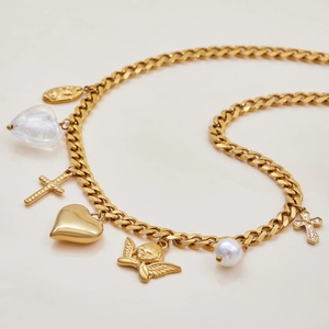 Layered gold Cuban chain necklace with heart, cross, angel, and pearl charms