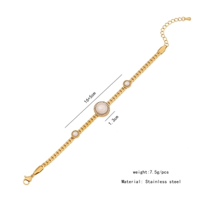 Macro view of gold stainless steel bracelet with cubic zirconia details and size specs