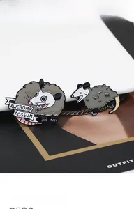 Detail of awesome opossum enamel pins made of zinc alloy for creative clothing accessories