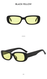 Macro view of vintage black rectangle sunglasses with bright yellow transparent lenses