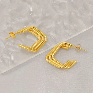 Three-layer square hoop earrings in 18K gold-plated stainless steel on a textured background