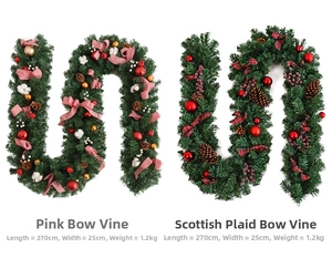 Detail of 2.7m Christmas garlands with pink bows, berries, and Scottish plaid patterns