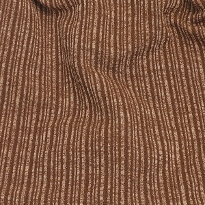 Macro shot of brown ribbed knit fabric showing soft texture and elastic vertical stripes