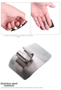 Close-up of adjustable stainless steel finger guard with brushed finish for safe cutting