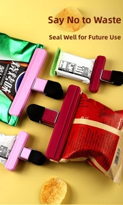 Pink T-shaped food sealing clips shown clamping various snack bags to keep food fresh