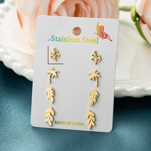 Golden stainless steel earring set with plant motifs like palm trees and leaves