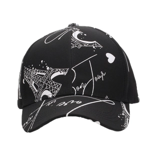Fashion baseball cap featuring white Eiffel Tower graffiti and Paris theme on black fabric