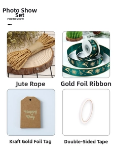 Close-up of Christmas gift wrapping kit with golden ribbons and hemp rope accessories