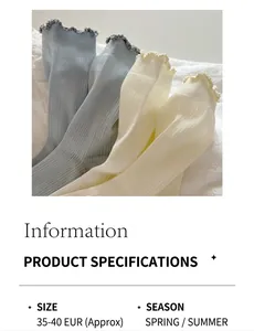 Size information and close-up detail of light blue knitted socks with ruffle trim edge