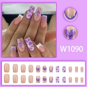 French purple press-on nails with heart and eye patterns in a 24-piece full set