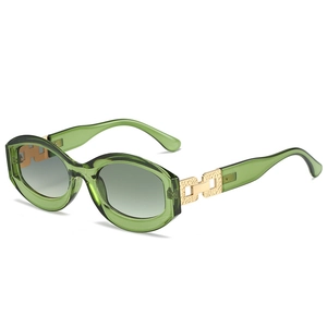Fashionable green oval frame sunglasses with gold hollow metal accents and gradient lenses