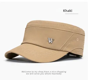 Detail of khaki cotton flat top military cap with a metallic letter W emblem