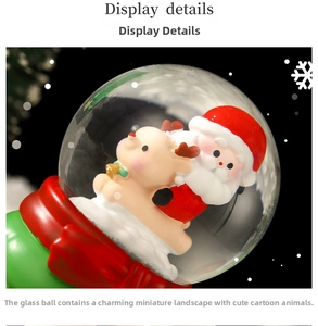 Close-up of Santa and reindeer figurines inside a festive glass snow globe with red base