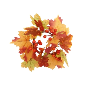 Autumn harvest candle ring featuring faux maple leaves and red berries for table decor