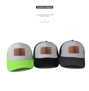 Three mesh trucker caps featuring USA flag leather patches in neon, black, and grey