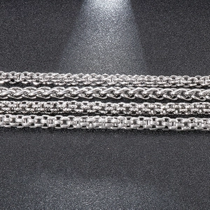 Mens punk woven stainless steel link bracelets in four diverse textures on black base