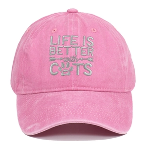 Close-up of pink washed cotton baseball cap with Life is Better with Cats embroidery