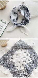Detail of black and white paisley cotton linen small square scarf with fine rolled edges