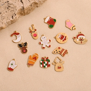 Set of 12 Christmas enamel pendants featuring Santa, reindeer, and snowman in gold finish
