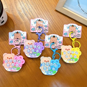Adorable bear whack-a-mole game keychain pendants in multiple colors for backpacks