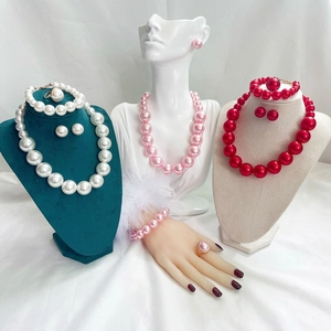 Elegant chunky pearl jewelry set including necklace, bracelet, earrings and ring in three colors