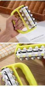 Close-up of handheld rolling massager with five rows of metal rollers and green handle
