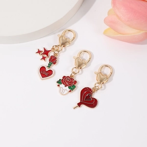 Gold-plated heart and rose enamel keychain set with LOVE engraving and heart-shaped clasp